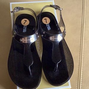 Michael Kors Black jelly sandals.